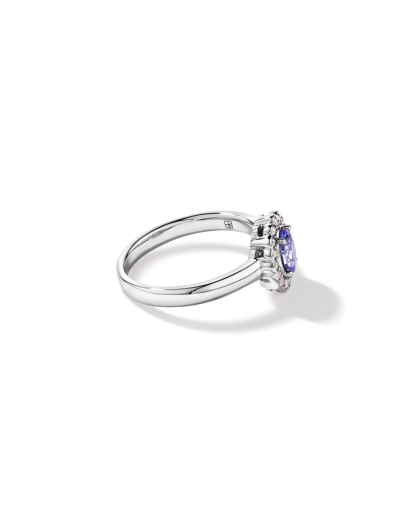 Tanzanite & 0.15TW of Diamond Halo Ring 10kt White Gold
