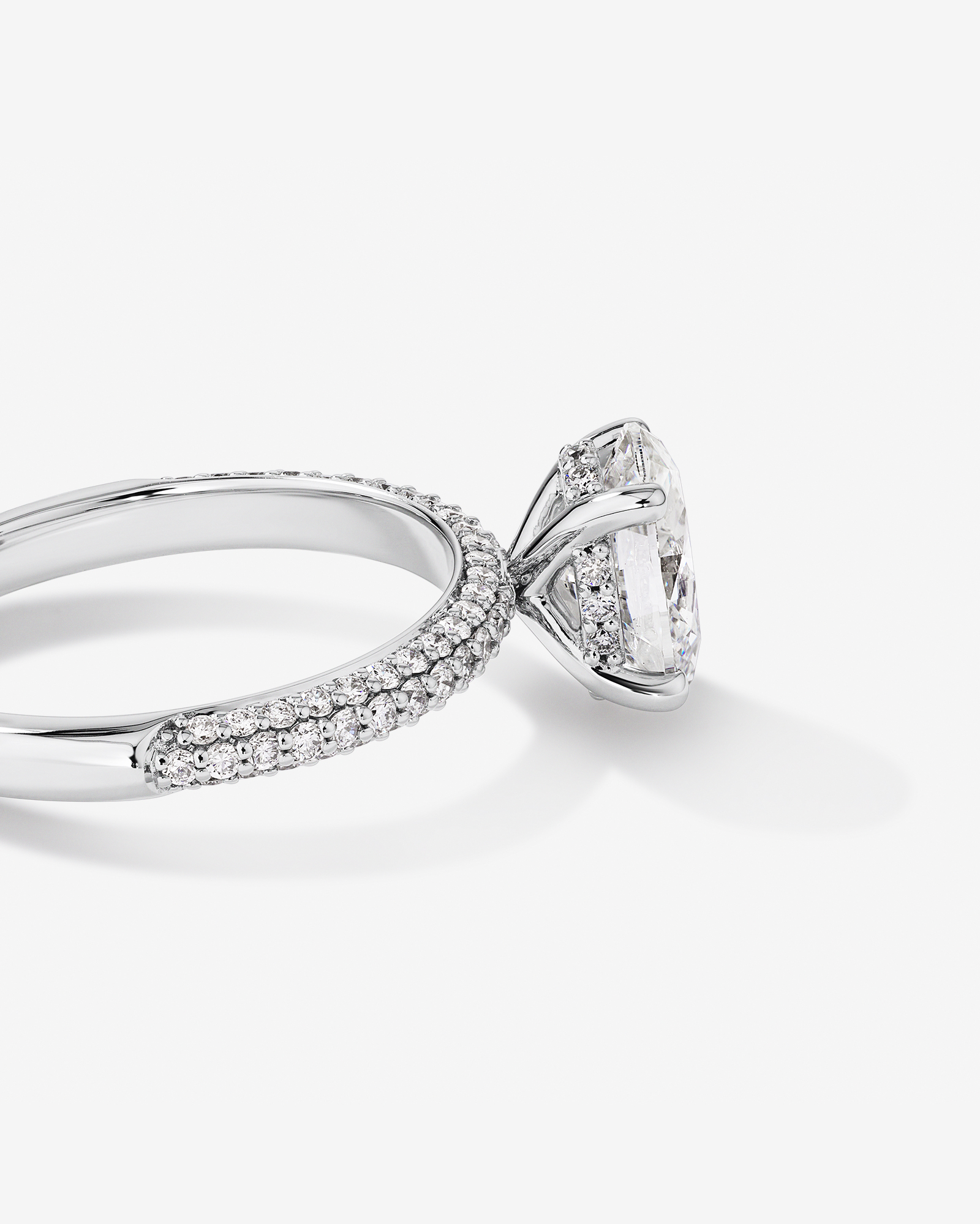 1.95 Carat TW Oval Cut Laboratory-Grown Diamond Solitaire Side Accent Engagement Ring 14kt Gold