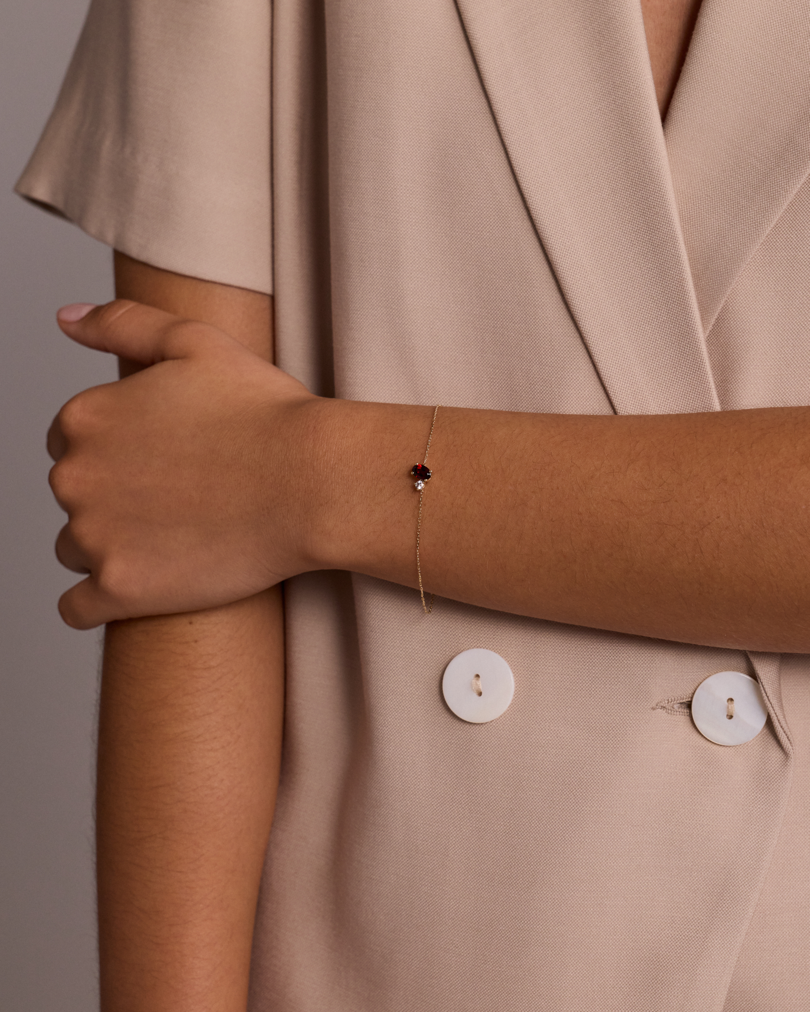 White Sapphire and Oval-Cut Garnet Toi Et Moi Bracelet in 10kt Yellow Gold