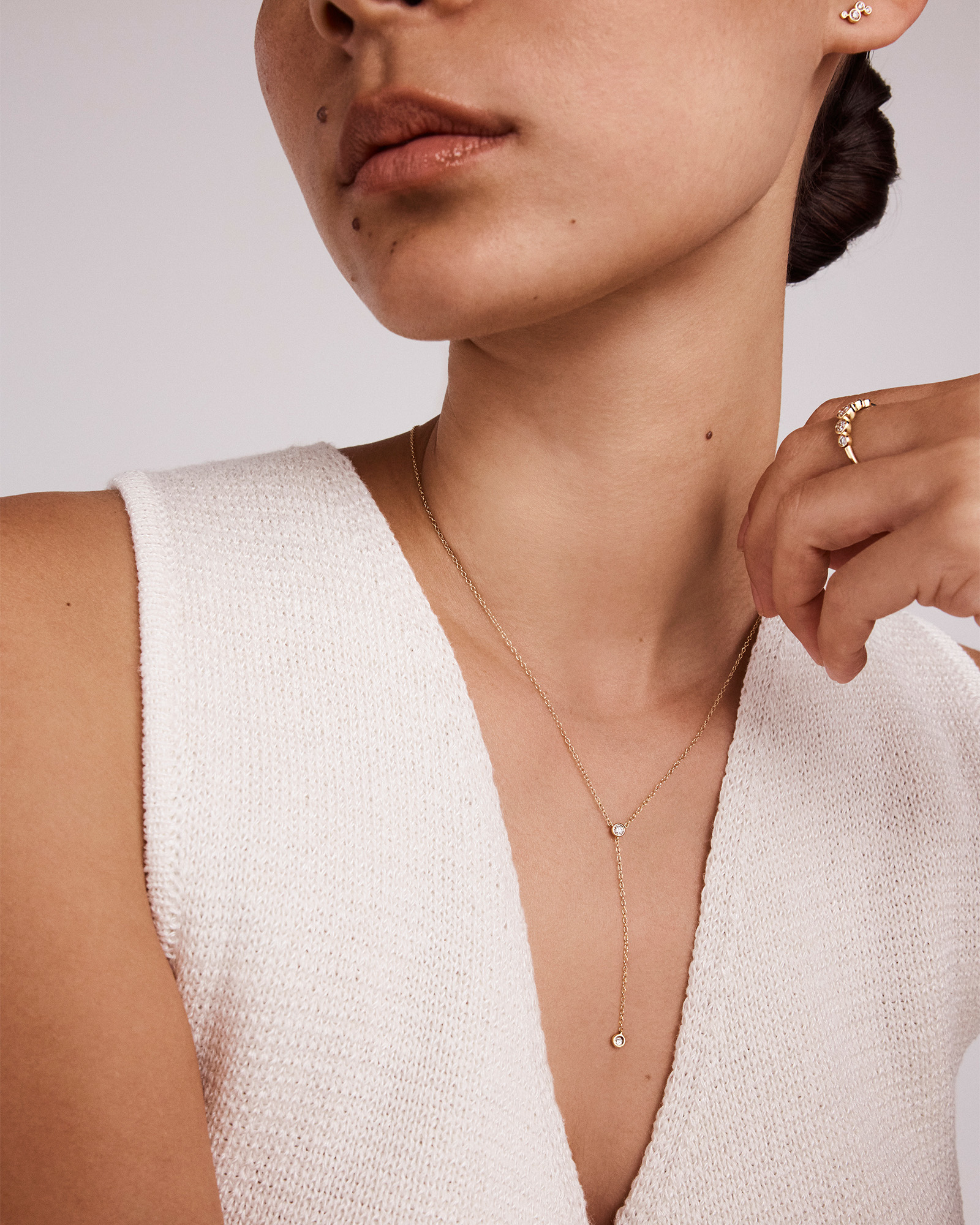 0.14 Carat TW Round Brilliant Diamond Bezel Set Lariat Necklace in 10kt Yellow Gold