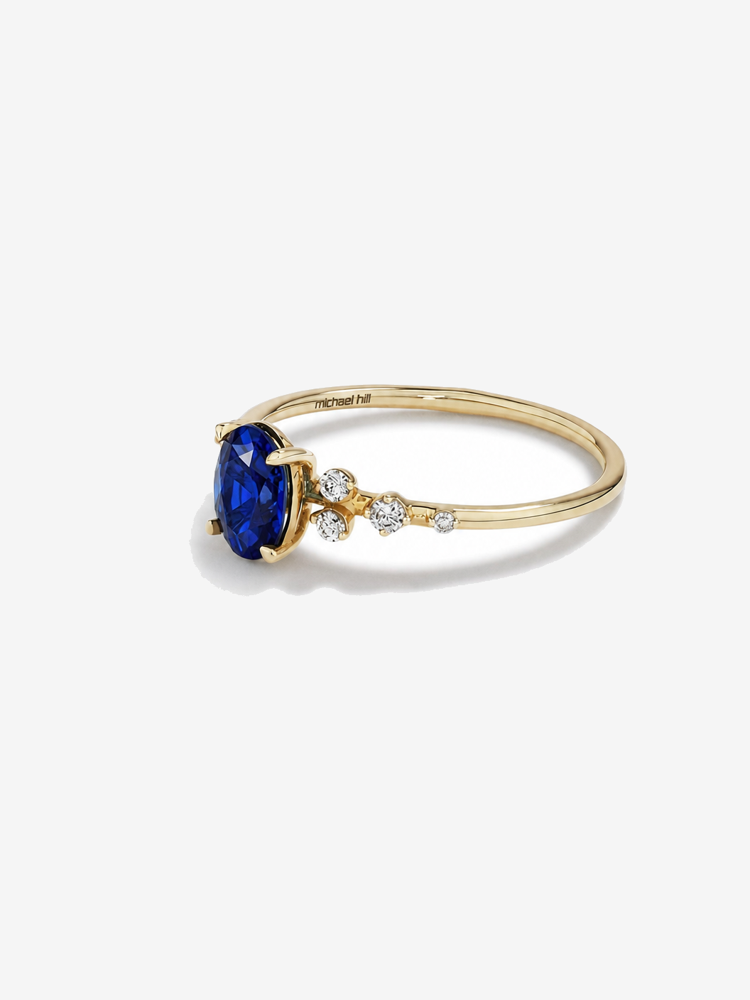 Sapphire and 0.12 Carat TW Diamond Ring 10kt Yellow Gold