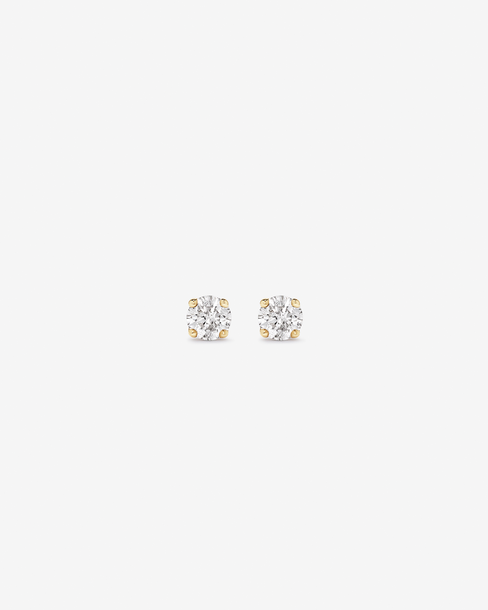 0.15 Carat TW Diamond Round Brilliant Mini Solitaire Stud Earrings in 10kt Yellow Gold