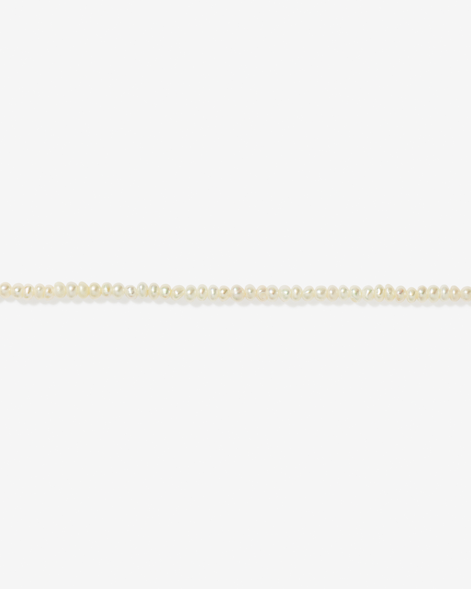 Bracelet en perles d’eau douce micro-cultivées en or jaune 10 carats