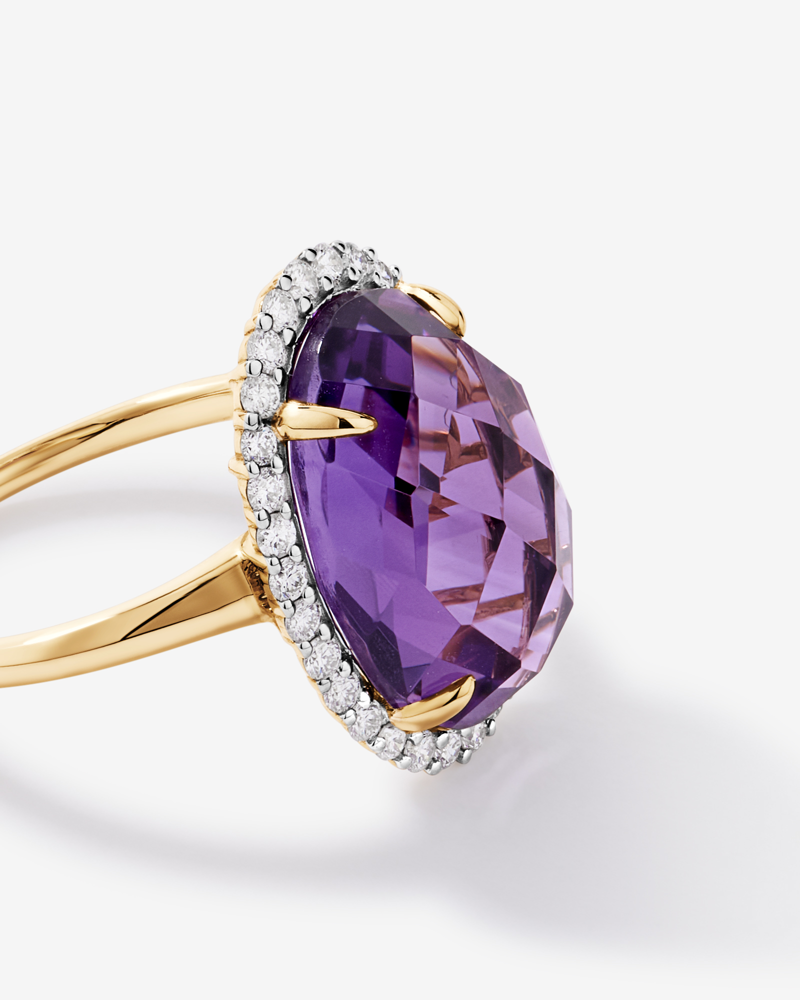 Oval Amethyst & 0.35 Carat TW Diamond Halo Ring 10kt Yellow Gold with Rhodium