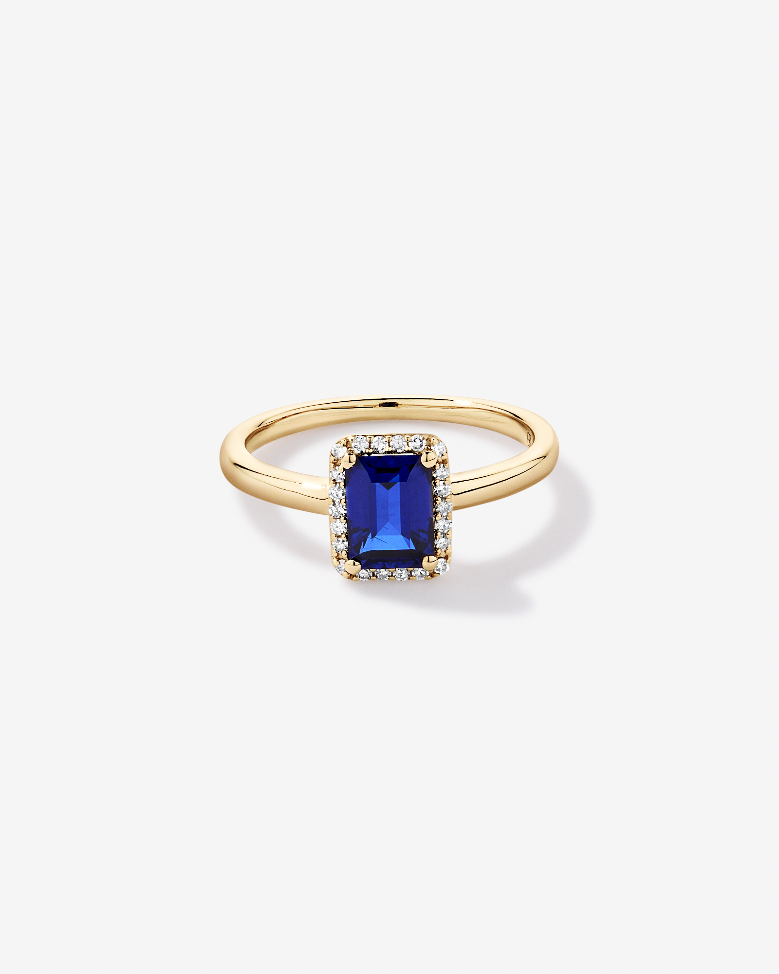 Emerald Cut Created Sapphire and Diamond Halo Ring 10kt Yellow Gold