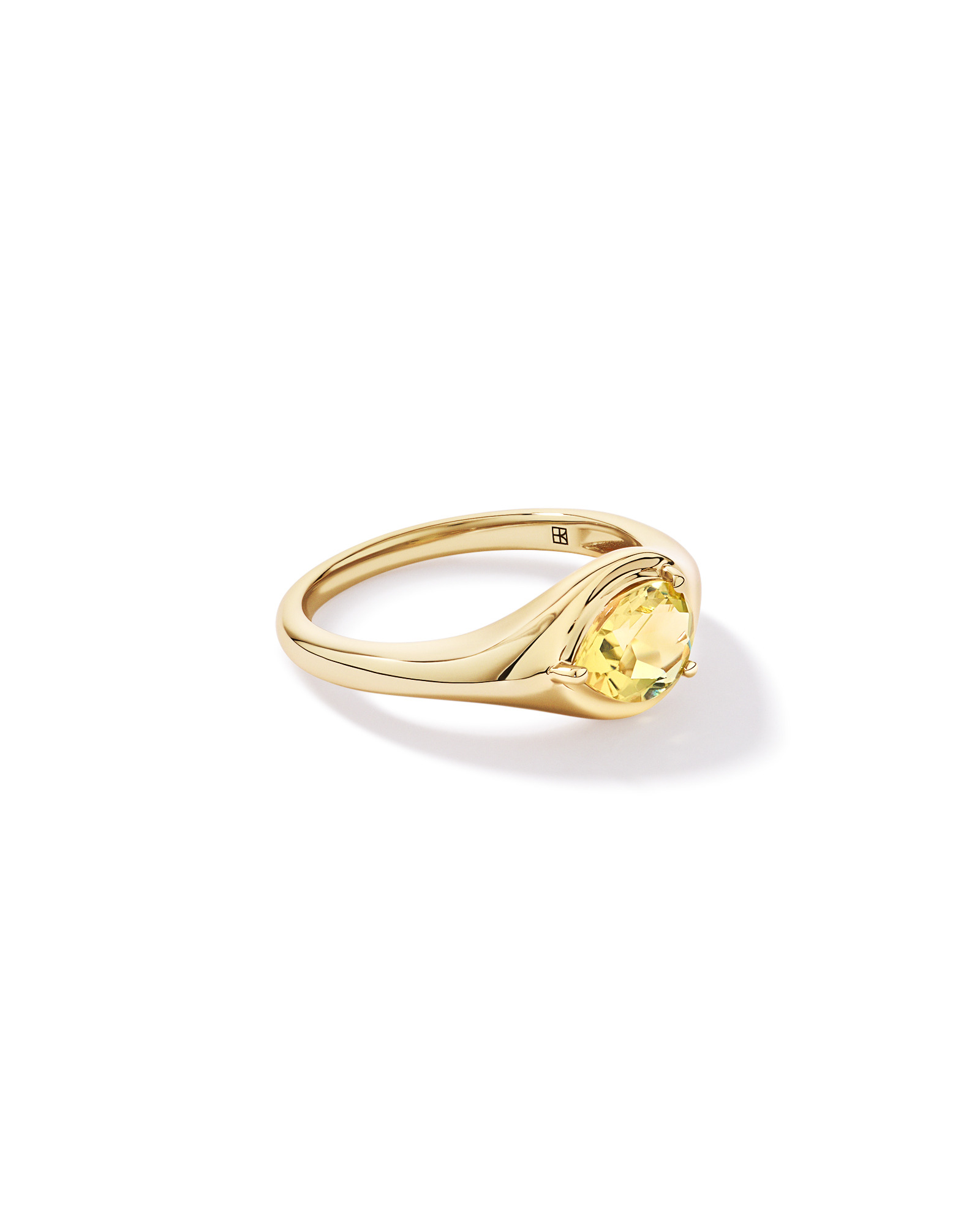 Anneau serti en quartz citron taillé poire d’est ouest or jaune 10 carats